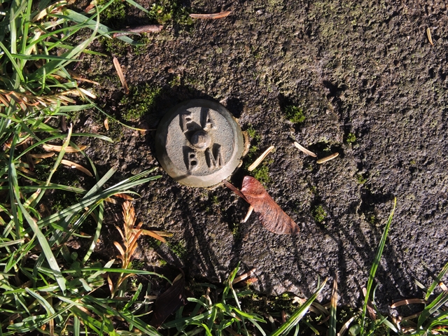 Environment Agency on Bench seat base opposite the Bishop's Palace